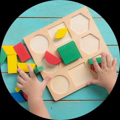 Image of a kids' puzzle with colourful blocks.