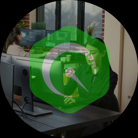 A man and woman at desks facing each other with QMentry logo overlay.