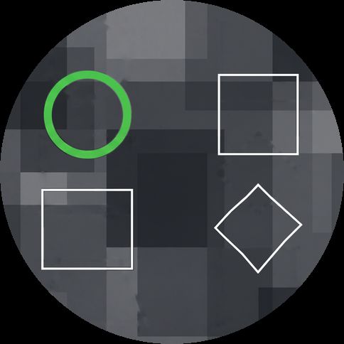 A grid of different shapes with one green circle standing out