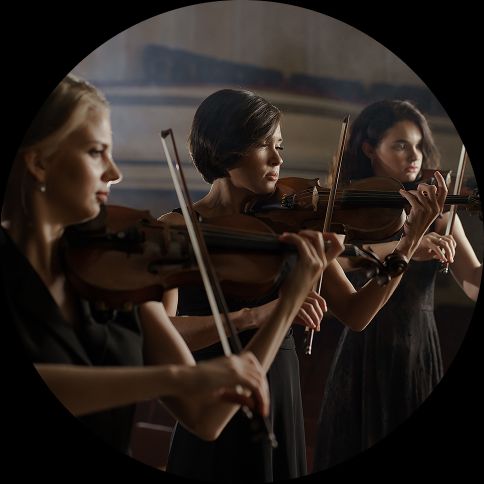 image of a woman playing an instrument.